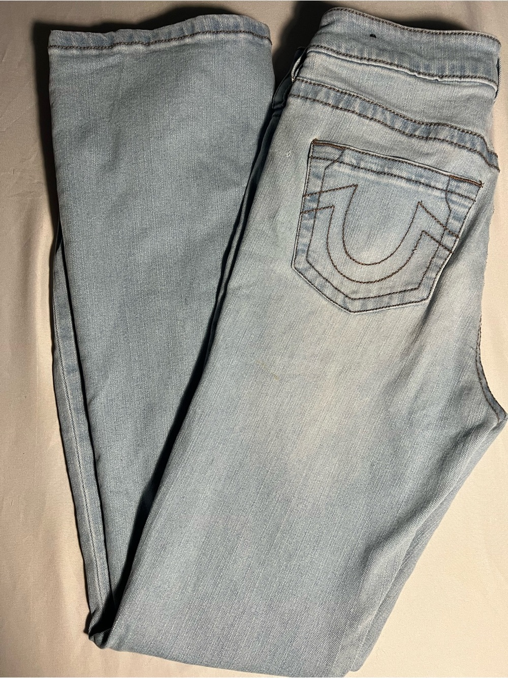 Light Wash Jeans with Signature Back Pocket Stitching True Religion